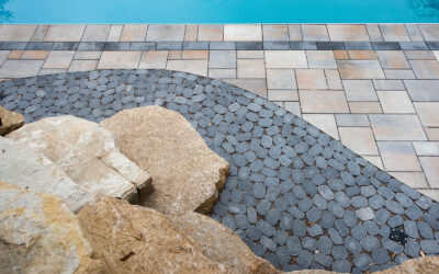 How is Superior Water Drainage Managed During the Initial Setup of a Paver Pool Deck Installation?