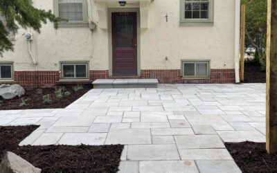 How Do Professional Teams Ensure Proper Base Preparation for a Long-Lasting Natural Stone Patio Installation?