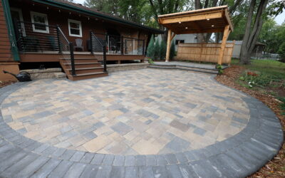 What is the Correct Base Preparation Process for a Paver Patio Installation to Prevent Settling and Movement?